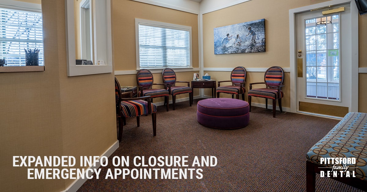 Dental office waiting room with striped chairs, purple ottoman, and windows showing closure notice.