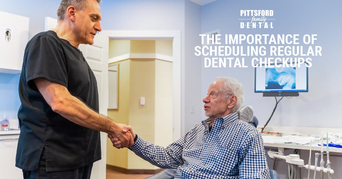 Dental professional shaking hands with elderly patient in modern dental office with text about regular checkups.