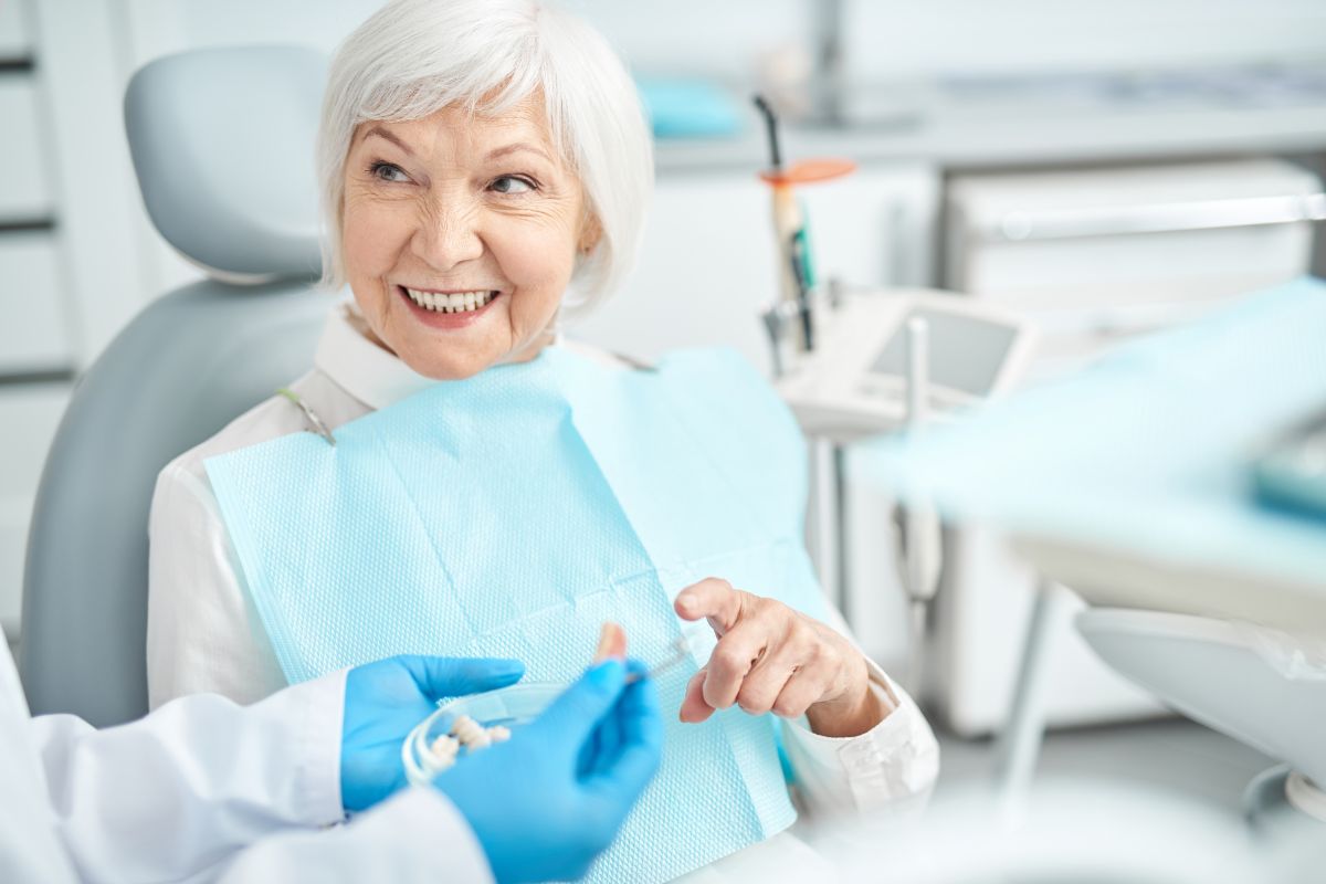 old women getting dental implant